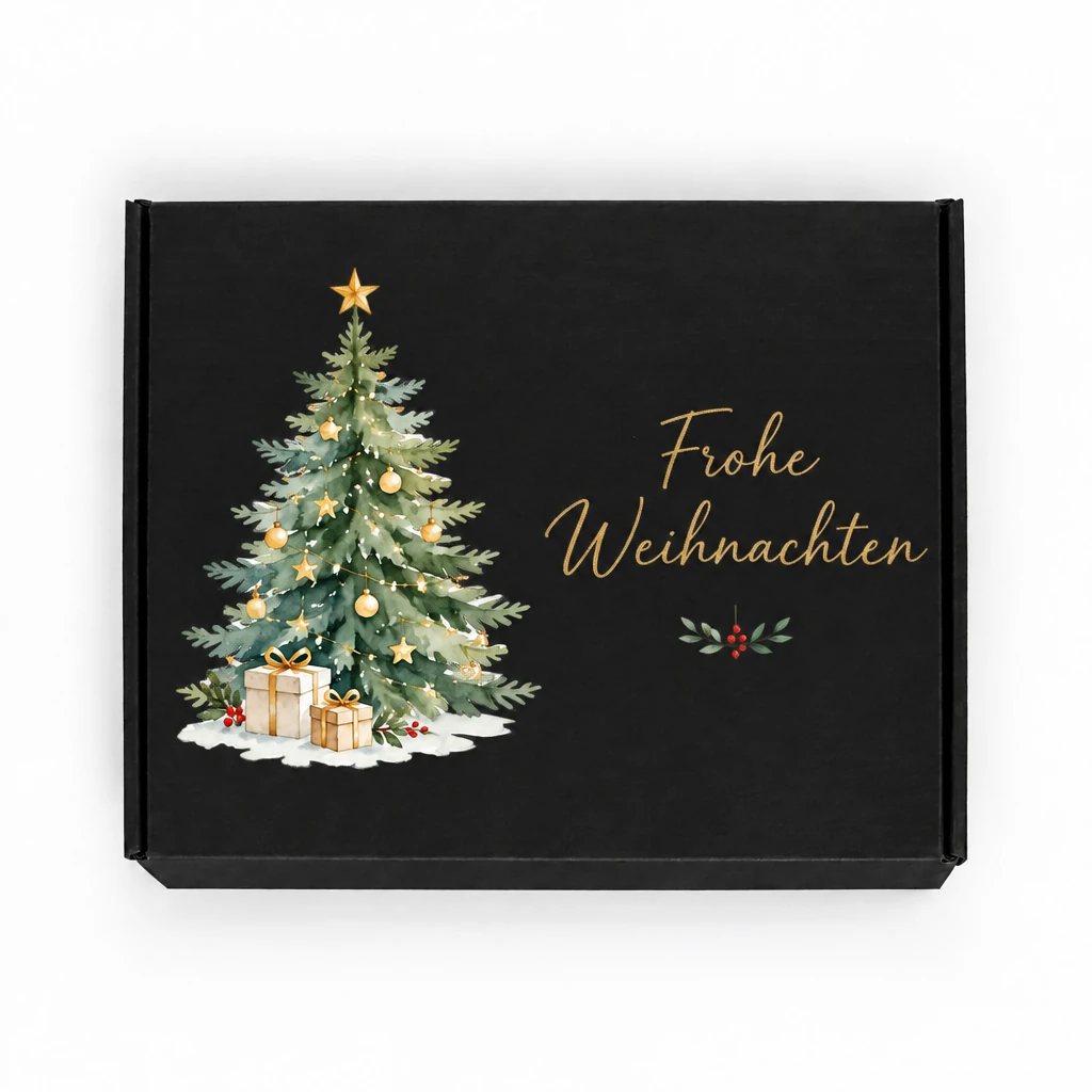 Schwarze Geschenkbox mit Weihnachtsbaum und dem Aufdruck Frohe Weihnachten
