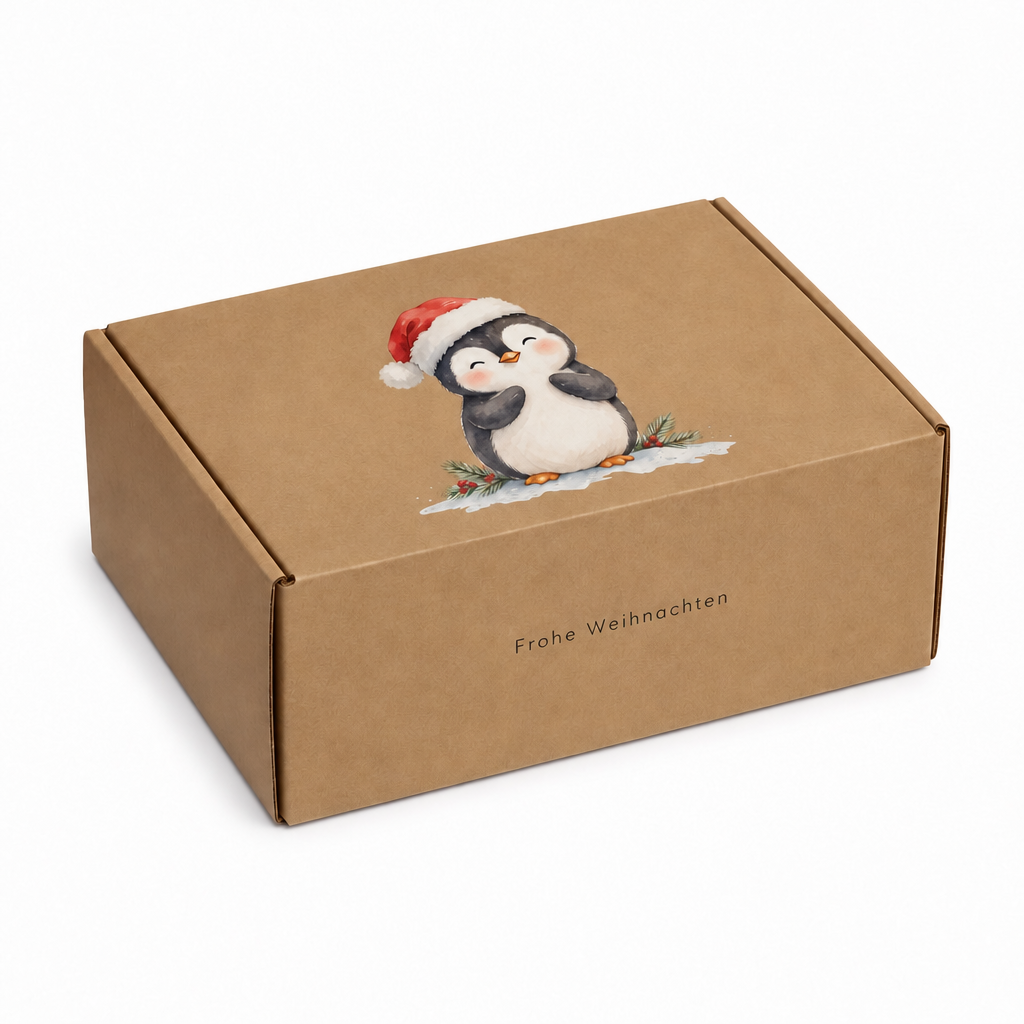Kraftpapier-Geschenkbox mit weihnachtlichem Pinguin und Aufdruck Frohe Weihnachten